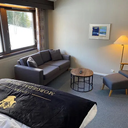 & - Unike Hotel