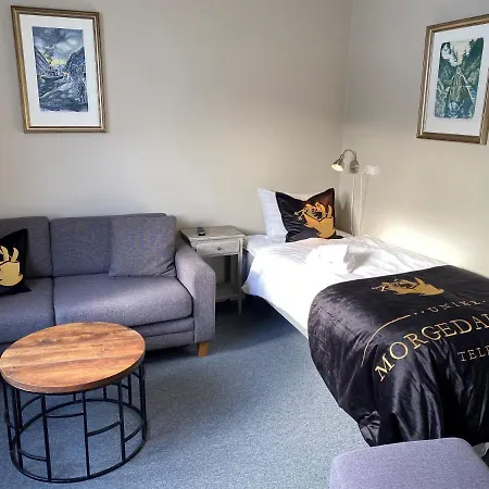 & - Unike Hotel